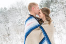A beautiful snowy engagement shoot at Lapham peak state park in Delafield, WI